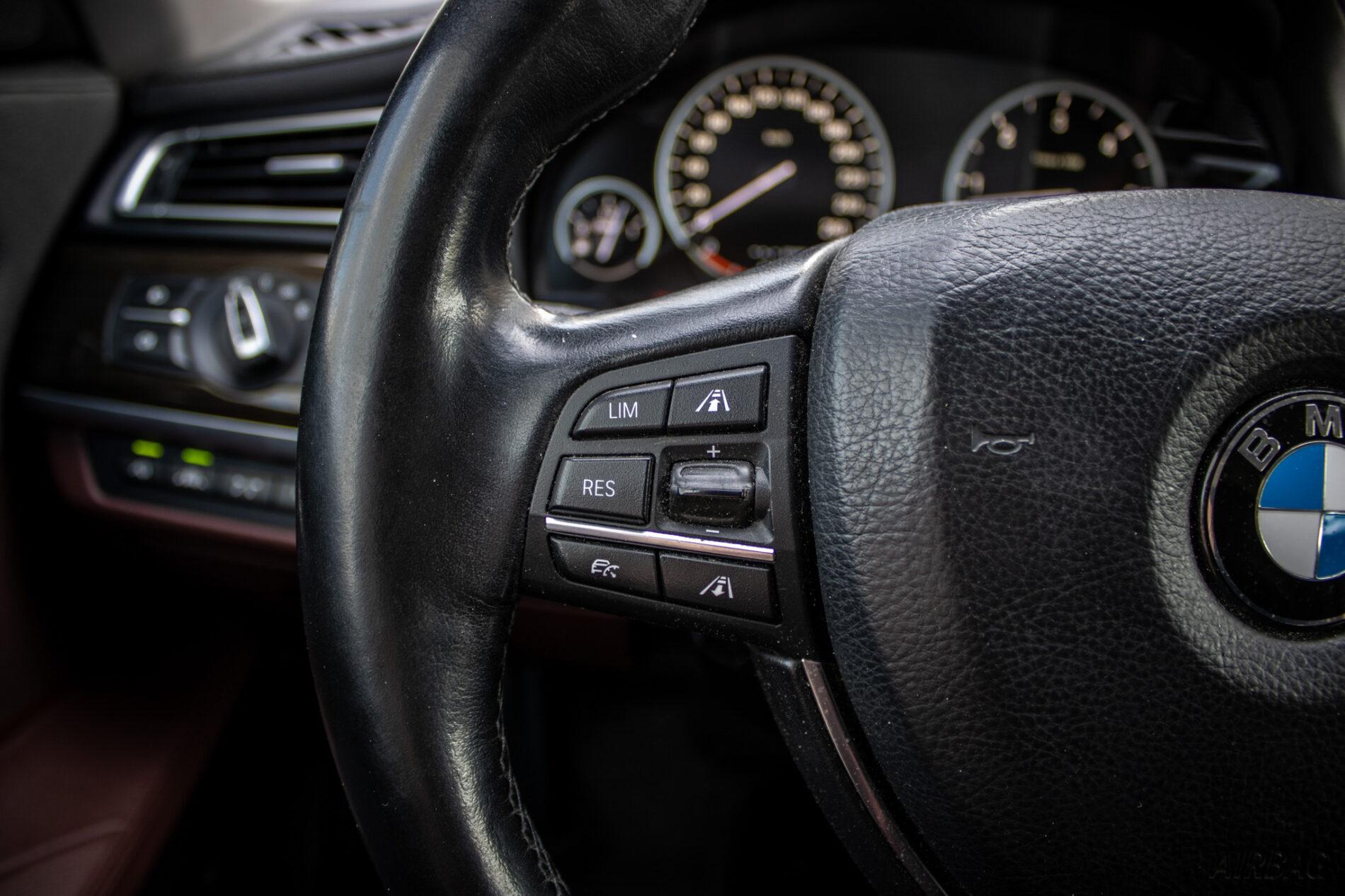 2013 BMW 750d, čierna sedan, 231 861 km