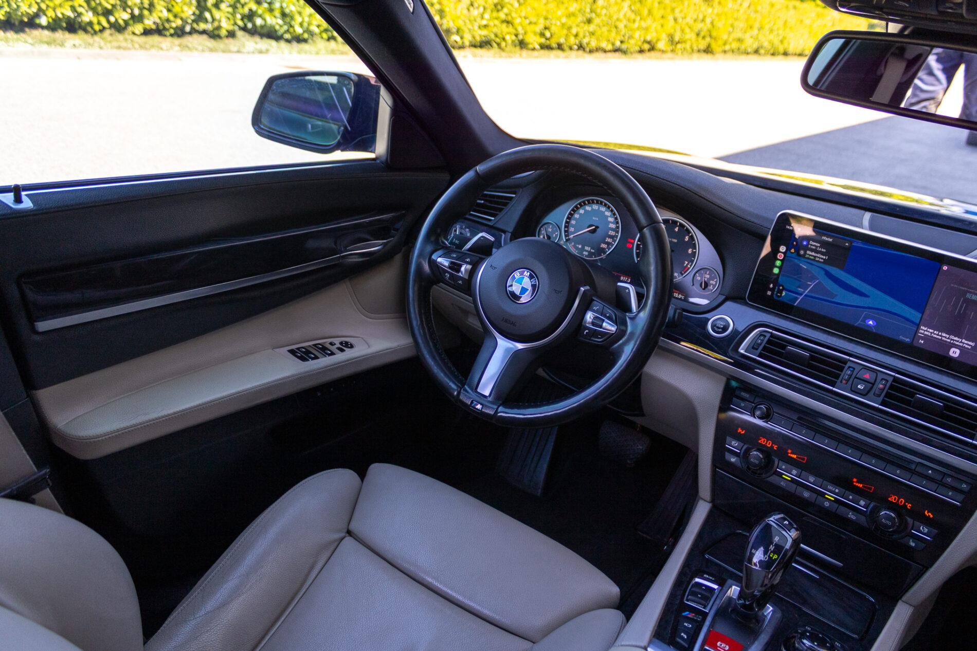 2009 BMW 740i, čierna sedan, 350 675 km