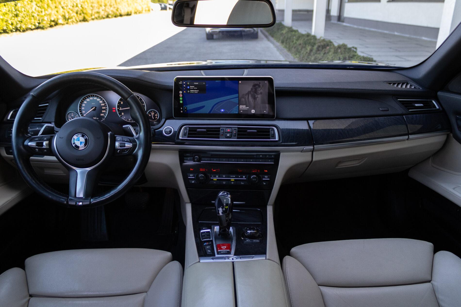 2009 BMW 740i, čierna sedan, 350 675 km