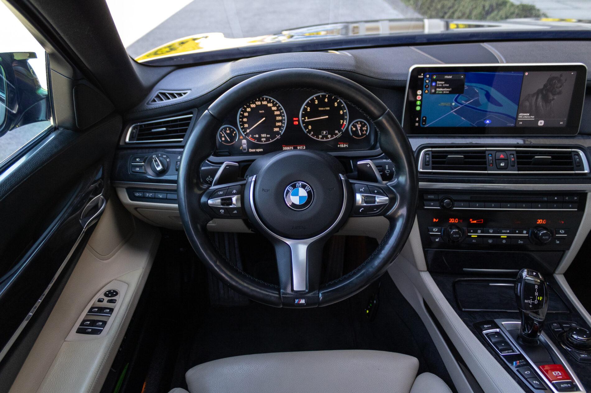2009 BMW 740i, čierna sedan, 350 675 km