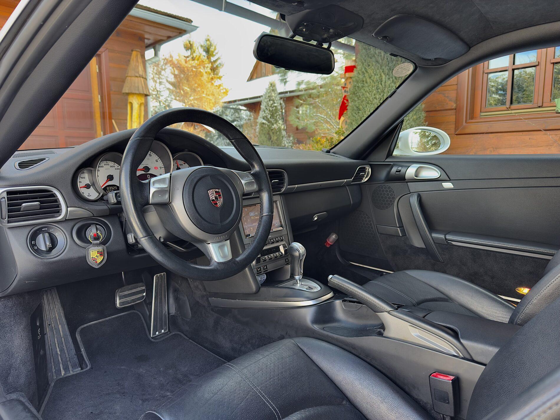 2008 Porsche 997 Carrera S, biela kupé, 83 929 km